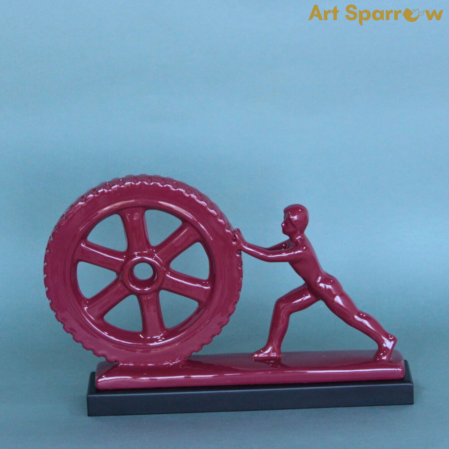 Man Pushing Wheel Human Strength Showpiece