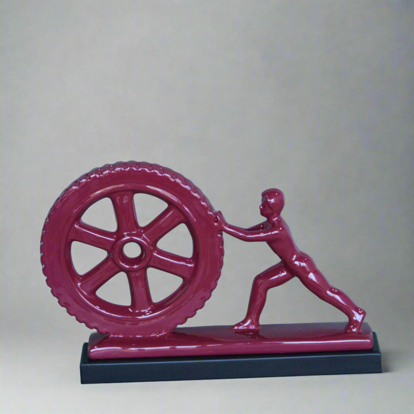 Man Pushing Wheel Human Strength Showpiece