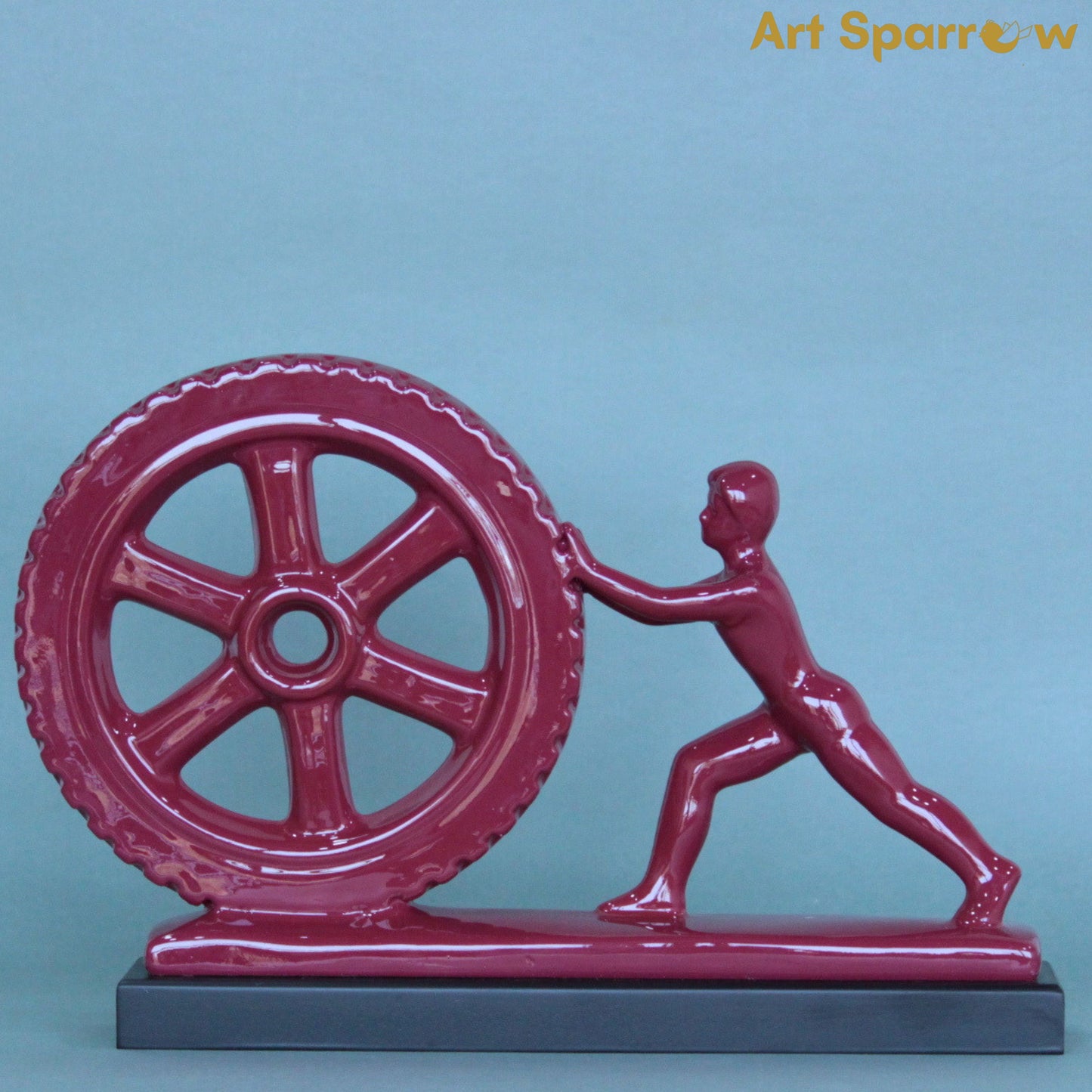 Man Pushing Wheel Human Strength Showpiece