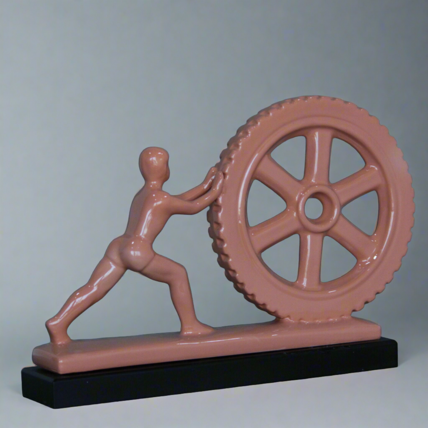 Man Pushing Wheel Human Strength Showpiece