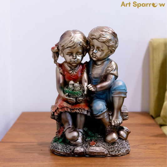 Baby Friends Sitting Together Showpiece