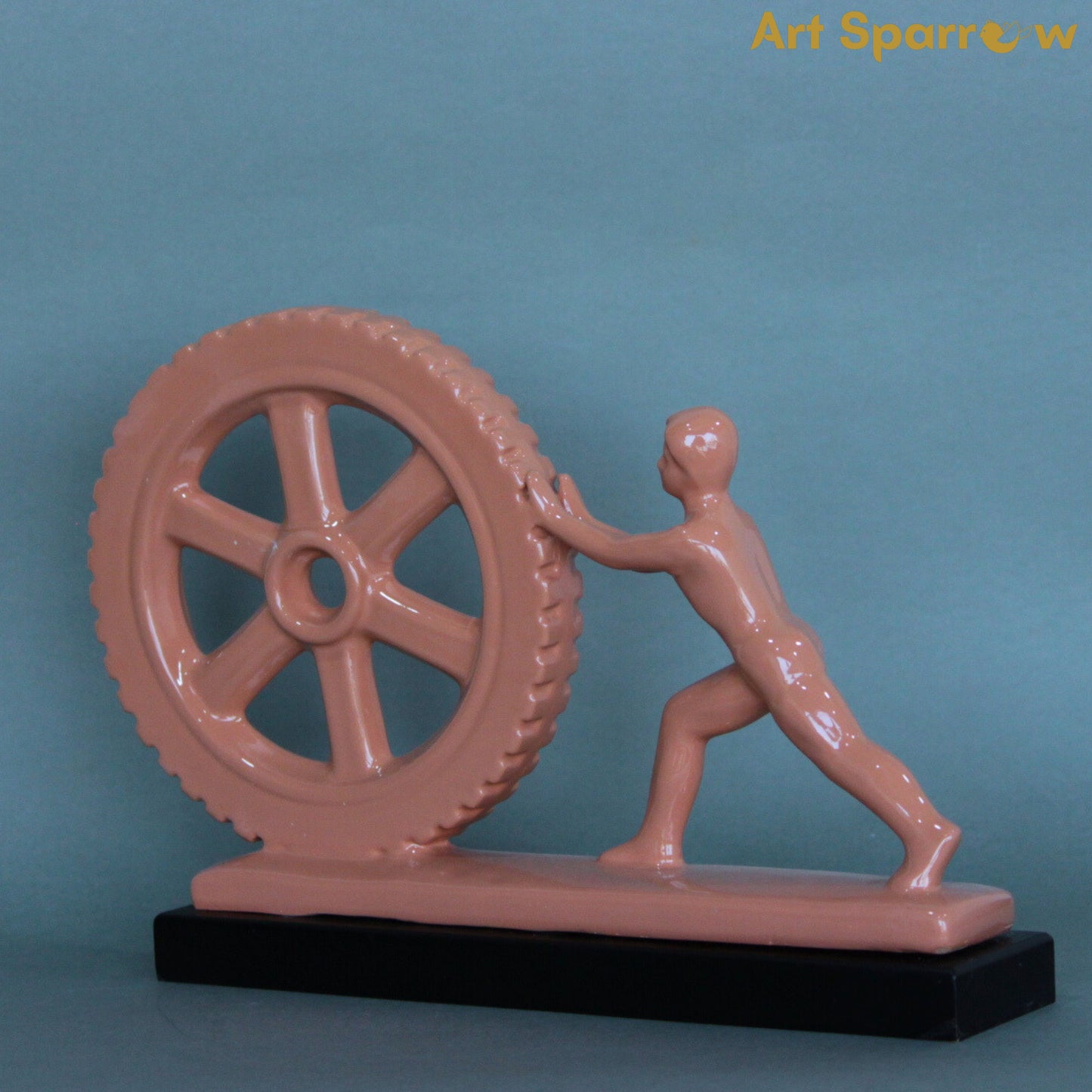 Man Pushing Wheel Human Strength Showpiece