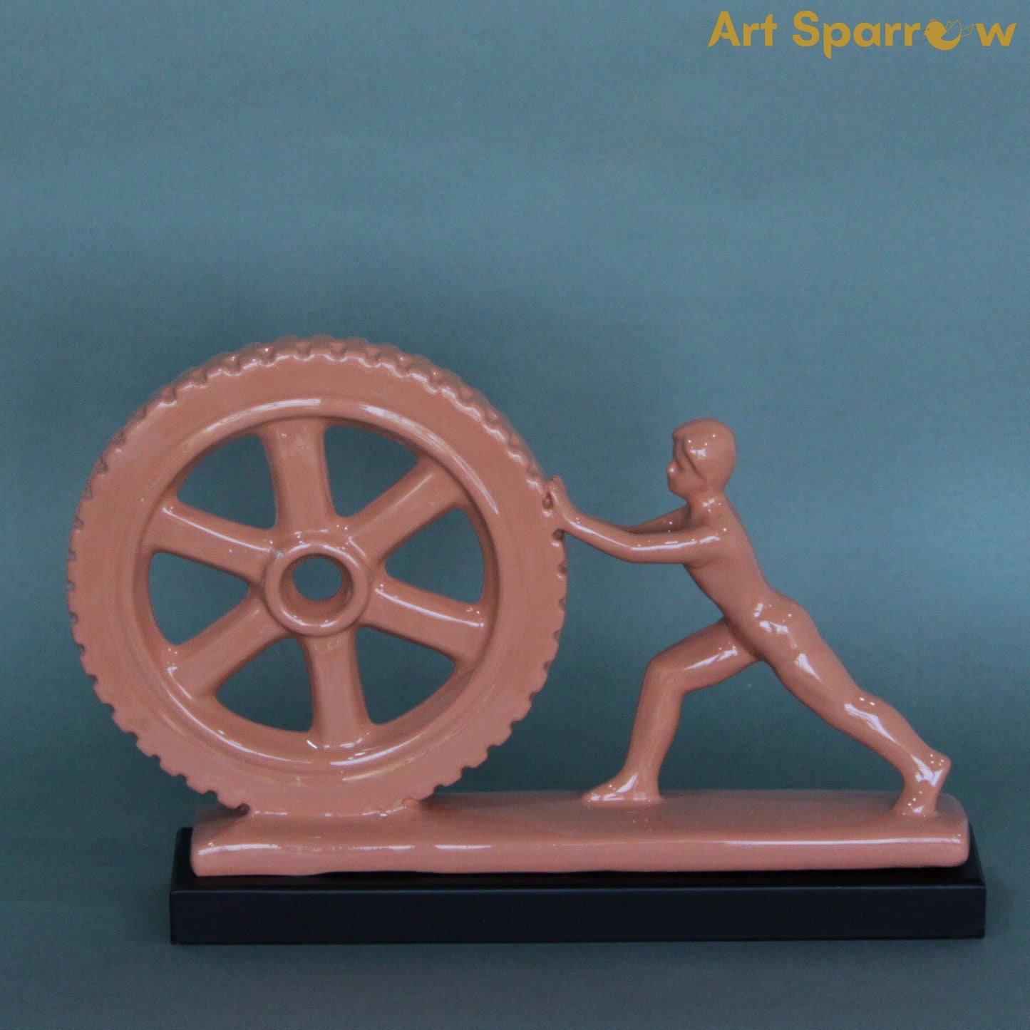 Man Pushing Wheel Human Strength Showpiece