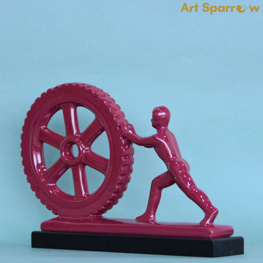 Man Pushing Wheel Human Strength Showpiece