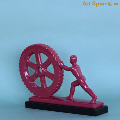 Man Pushing Wheel Human Strength Showpiece